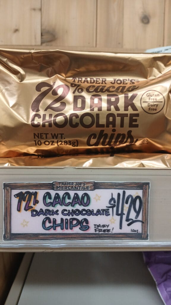 Bag of Trader Joe’s 72% cacao dark chocolate chips on a store shelf with a $4.29 price tag