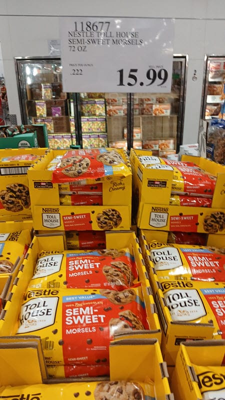 Costco display of Nestlé Toll House semi-sweet chocolate morsels with a $15.99 price sign