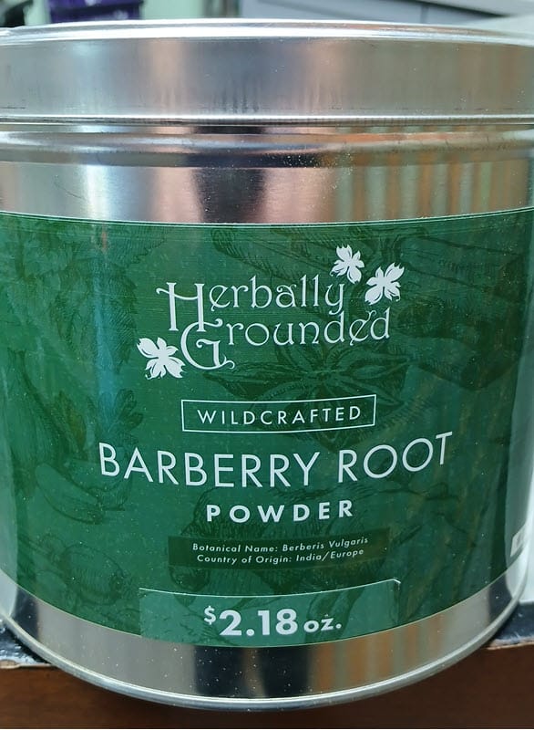 Herbally Grounded wildcrafted barberry root powder in a metal tin