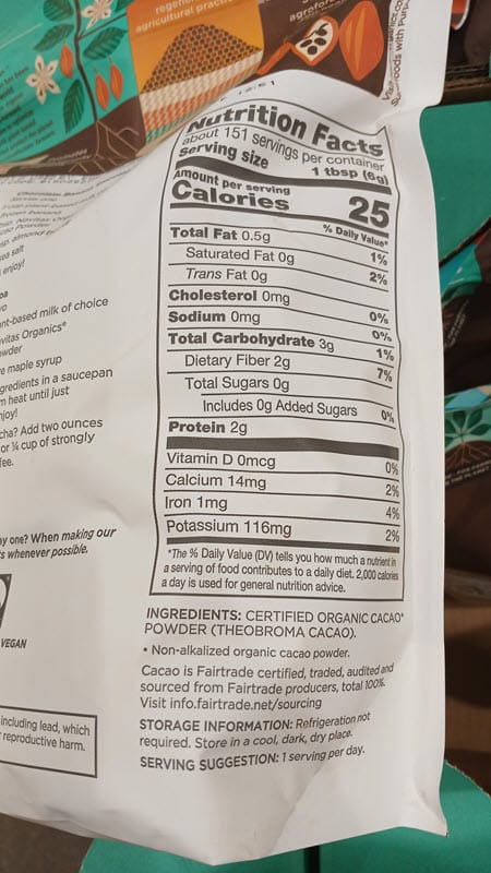 Back label of Navitas Organics cacao powder showing its Nutrition Facts and single ingredient of certified organic cacao