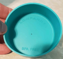 Inside of a teal silicone tumbler boot embossed with ‘LONPARRY’ and ‘BPA FREE’