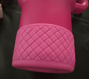 Customer photo of a pink quilted silicone boot on the bottom of a pink tumbler