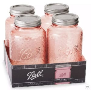 Four-pack of Ball 32 oz rose-colored quart mason jars in their retail box