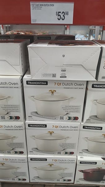 Sam’s Club display of Tramontina 7-quart enameled cast-iron Dutch ovens with a $53.98 price sign
