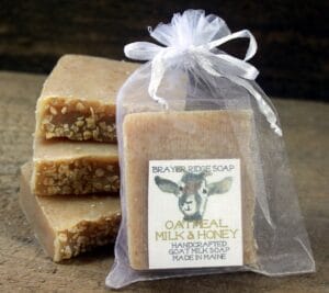 Brayer Ridge Soap oatmeal, milk, and honey goat-milk soap bars, one presented in an organza gift bag